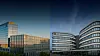 Modern glass office buildings under a clear evening sky.