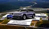 Aerial view of Volkswagen Chattanooga plant with large Atlas SUV and ID.4 images superimposed on the roof.