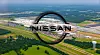 Aerial view of Nissan’s large Canton car plant surrounded by roads and green fields.
