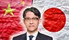 Portrait of a suited man overlaid on the Japanese and Chinese flags.