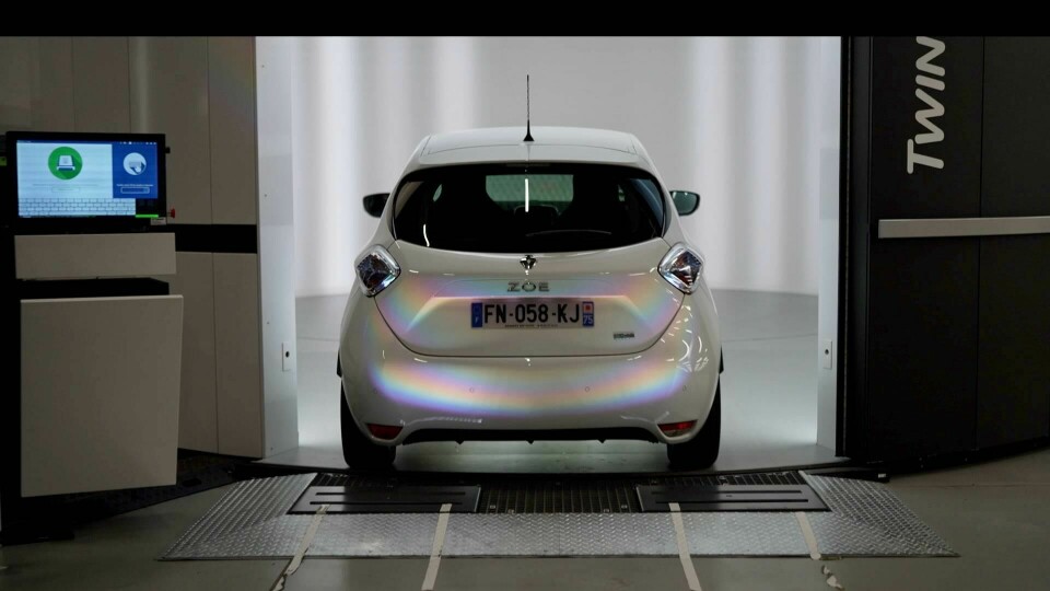 A just-refurbished Renault Zoe enters the photo booth for pictures to be displayed on a dealership website. 2021_-_FACTORY_VO_-_Flins
