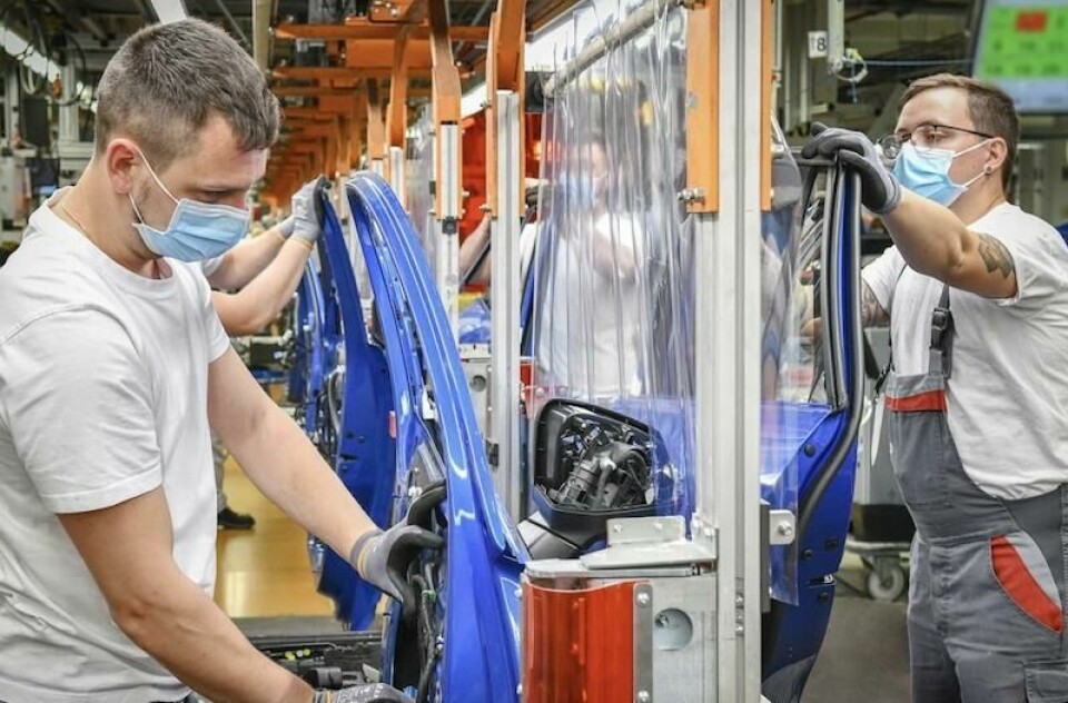 One example of the new measures at Ingolstadt, door line workers assembling Audi A3 and Q2 doors are separated by a newly fixed plastic curtain that offers extra protection Audi Ingolstadt resumes