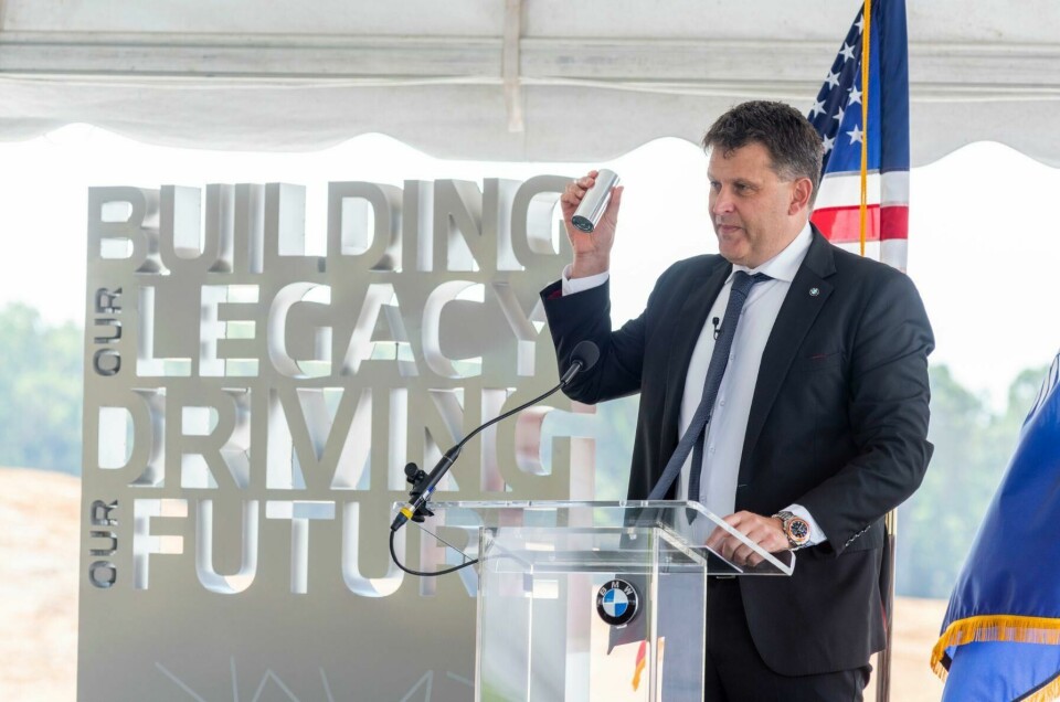 BMW Manufacturing CEO Robert Engelhorn holding a cylinder-shaped battery cell in the style of BMW’s gen-6 batteries Robert Engelhorn, BMW holds a generation six battery cell