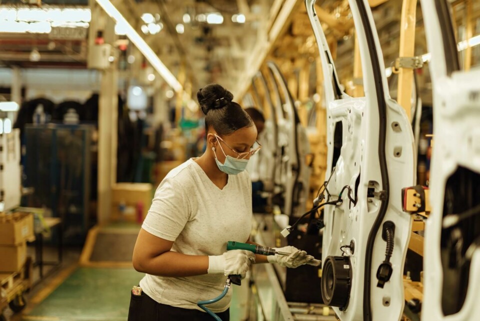 An assembly line worker at Ford’s Silverton, South Africa plant Ford_Create Must-Have Products and Services_02