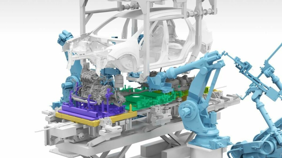Nissan’s powertrain mounting system adapts to manage three variants of powertrain in up to 27 different module combinations Nissan powertrain install robot