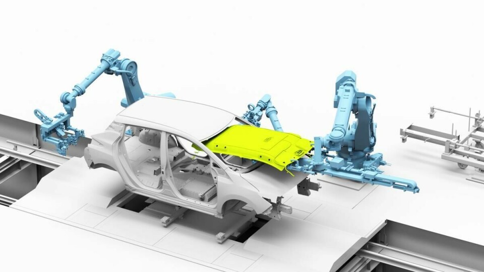 Using robots to insert the headliner represents a significant breakthrough Nissan headliner robot