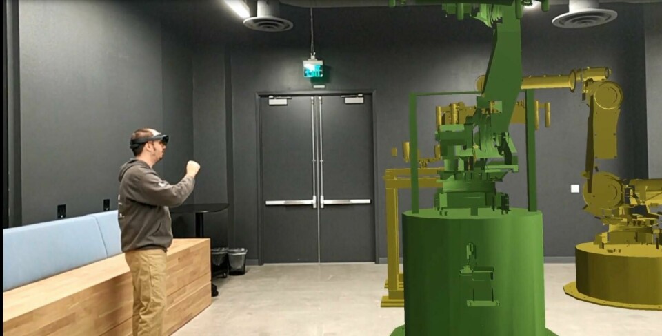 Simulate to fabricate: vehicle plants keep VR and AR in their sights Volkswagen_brings_augmented_reality_to_life_along_the_factory_line--11115