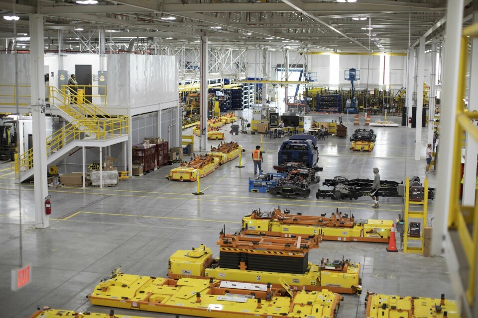 The Rouge Electric Vehicle Center uses AGVs to move F-150 Lightning through assembly Lightning Production Restarts
